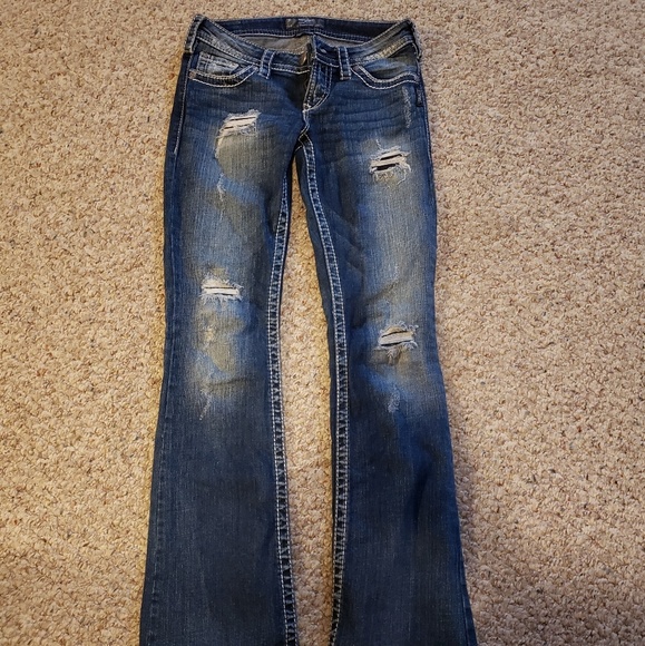 Silver Jeans Denim - Silvers distressed boot cut jeans